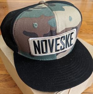 Noveske branded snapback hat.